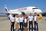 Group picture in front of Eurowings aircraft